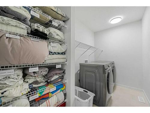 58 Seton Road Se, Calgary, AB - Indoor Photo Showing Laundry Room