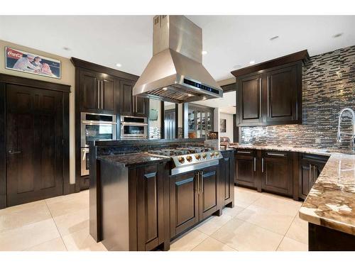 33009 Mountain Glen View, Rural Rocky View County, AB - Indoor Photo Showing Kitchen With Upgraded Kitchen