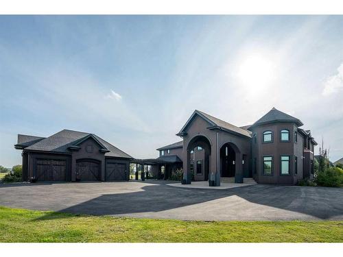 33009 Mountain Glen View, Rural Rocky View County, AB - Outdoor With Facade