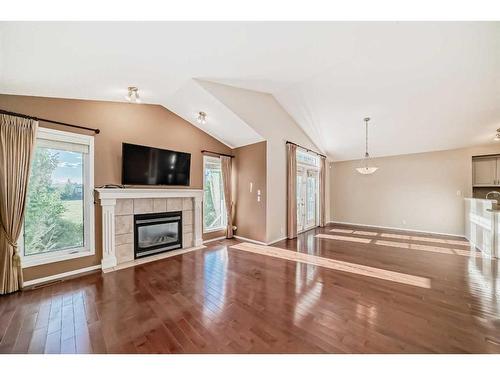 1340 Shannon Common Sw, Calgary, AB - Indoor Photo Showing Living Room With Fireplace