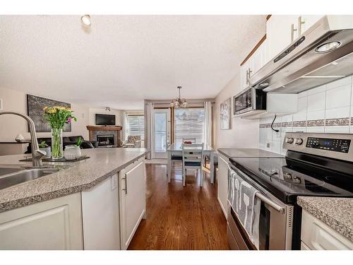 15225 Prestwick Boulevard Se, Calgary, AB - Indoor Photo Showing Kitchen With Double Sink