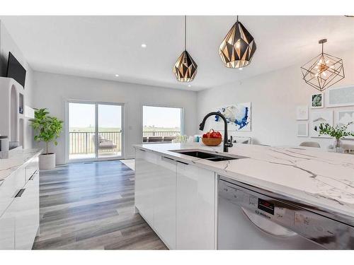 194 Muirfield Boulevard, Lyalta, AB - Indoor Photo Showing Kitchen With Double Sink