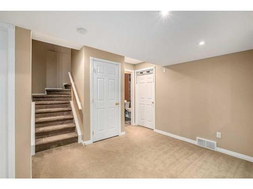 170 Rocky Ridge Point Nw, Calgary, AB - Indoor Photo Showing Other Room