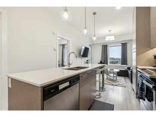 1421-76 Cornerstone Passage Ne, Calgary, AB - Indoor Photo Showing Kitchen With Double Sink With Upgraded Kitchen