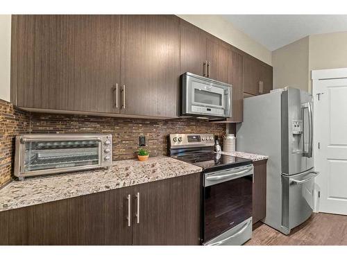 428 Rainbow Falls Drive, Chestermere, AB - Indoor Photo Showing Kitchen With Stainless Steel Kitchen With Upgraded Kitchen