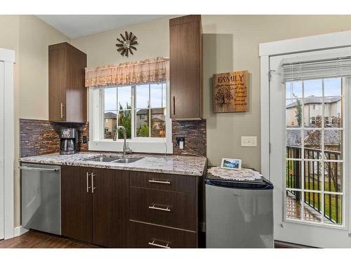 428 Rainbow Falls Drive, Chestermere, AB - Indoor Photo Showing Kitchen With Double Sink With Upgraded Kitchen