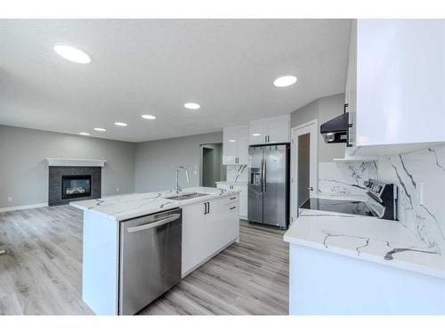 434 Coopers Drive Sw, Airdrie, AB - Indoor Photo Showing Kitchen