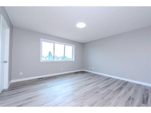 434 Coopers Drive Sw, Airdrie, AB - Indoor Photo Showing Other Room