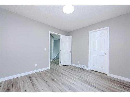 434 Coopers Drive Sw, Airdrie, AB - Indoor Photo Showing Other Room