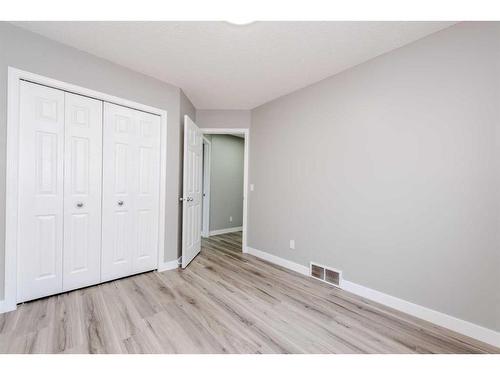 434 Coopers Drive Sw, Airdrie, AB - Indoor Photo Showing Other Room