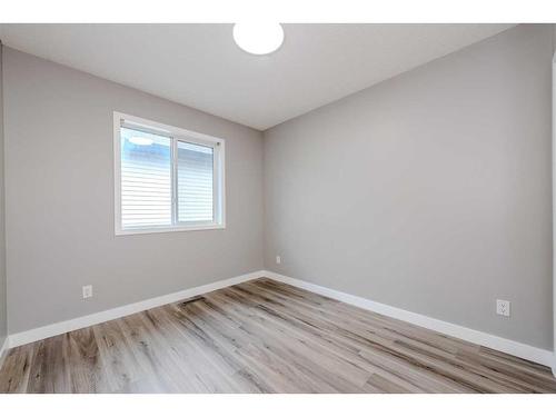 434 Coopers Drive Sw, Airdrie, AB - Indoor Photo Showing Other Room