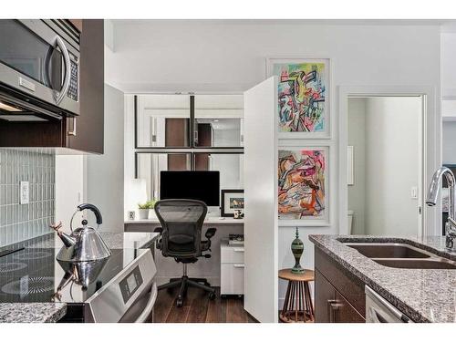 109-1730 5A Street Sw, Calgary, AB - Indoor Photo Showing Kitchen With Double Sink