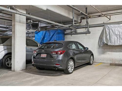 109-1730 5A Street Sw, Calgary, AB - Indoor Photo Showing Garage