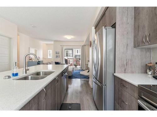 202 Nolanlake Villas Nw, Calgary, AB - Indoor Photo Showing Kitchen With Stainless Steel Kitchen With Double Sink With Upgraded Kitchen