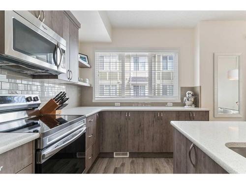 202 Nolanlake Villas Nw, Calgary, AB - Indoor Photo Showing Kitchen