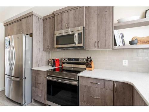 202 Nolanlake Villas Nw, Calgary, AB - Indoor Photo Showing Kitchen With Stainless Steel Kitchen