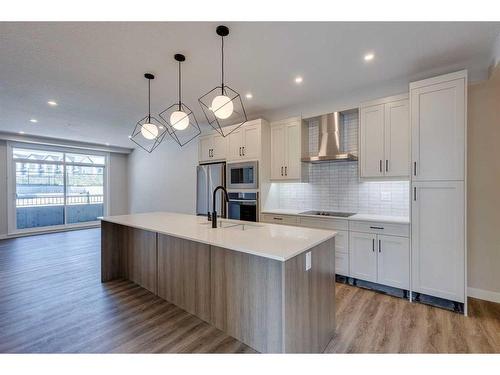 101-50 Sage Hill Walk Nw, Calgary, AB - Indoor Photo Showing Kitchen With Upgraded Kitchen