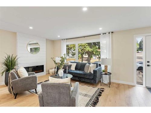 5716 Dalmead Crescent Nw, Calgary, AB - Indoor Photo Showing Living Room With Fireplace