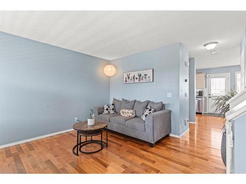 138 Bridleridge Circle Sw, Calgary, AB - Indoor Photo Showing Living Room