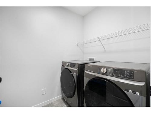 299 Seton Road Se, Calgary, AB - Indoor Photo Showing Laundry Room