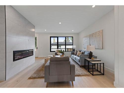 4608 82 Street Nw, Calgary, AB - Indoor Photo Showing Living Room With Fireplace