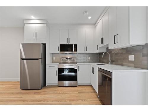 4608 82 Street Nw, Calgary, AB - Indoor Photo Showing Kitchen With Stainless Steel Kitchen With Upgraded Kitchen