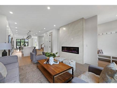 4608 82 Street Nw, Calgary, AB - Indoor Photo Showing Living Room With Fireplace