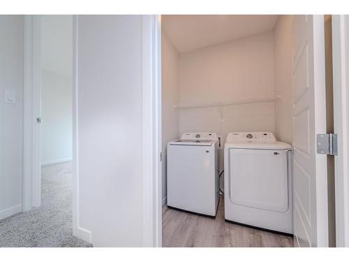 94 Edith Green Nw, Calgary, AB - Indoor Photo Showing Laundry Room