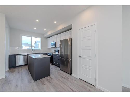 94 Edith Green Nw, Calgary, AB - Indoor Photo Showing Kitchen With Upgraded Kitchen