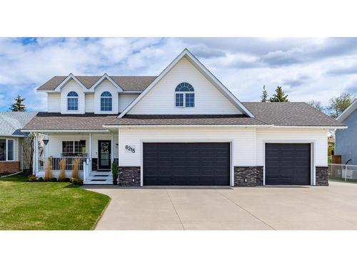 6215 Douglas Place, Olds, AB - Outdoor With Facade