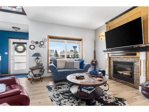 6215 Douglas Place, Olds, AB - Indoor Photo Showing Living Room With Fireplace