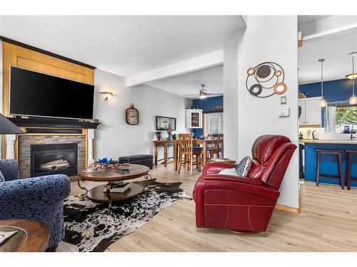 6215 Douglas Place, Olds, AB - Indoor Photo Showing Living Room With Fireplace