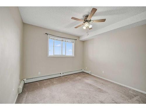 2420-10 Prestwick Bay Se, Calgary, AB - Indoor Photo Showing Other Room