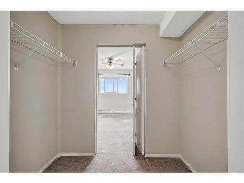 2420-10 Prestwick Bay Se, Calgary, AB - Indoor Photo Showing Other Room