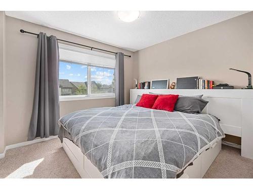 114 New Brighton Landing Se, Calgary, AB - Indoor Photo Showing Bedroom