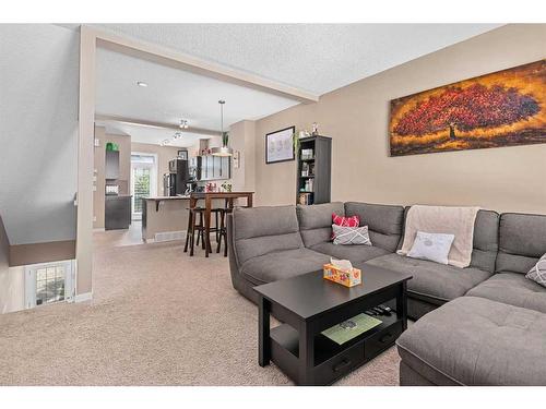 114 New Brighton Landing Se, Calgary, AB - Indoor Photo Showing Living Room