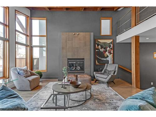 914 8 Avenue Se, Calgary, AB - Indoor Photo Showing Living Room With Fireplace