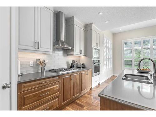 91 Cranbrook Crescent Se, Calgary, AB - Indoor Photo Showing Kitchen With Double Sink With Upgraded Kitchen