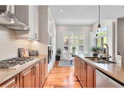 91 Cranbrook Crescent Se, Calgary, AB - Indoor Photo Showing Kitchen With Double Sink With Upgraded Kitchen