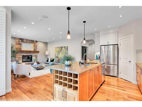 91 Cranbrook Crescent Se, Calgary, AB - Indoor Photo Showing Kitchen With Fireplace With Upgraded Kitchen