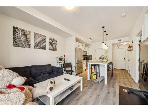 4111-200 Seton Circle Se, Calgary, AB - Indoor Photo Showing Living Room