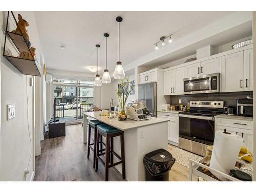 4111-200 Seton Circle Se, Calgary, AB - Indoor Photo Showing Kitchen With Stainless Steel Kitchen With Upgraded Kitchen