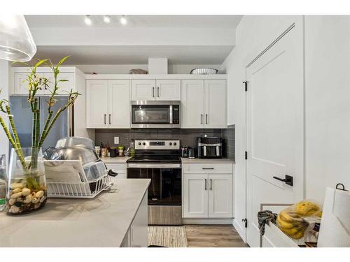 4111-200 Seton Circle Se, Calgary, AB - Indoor Photo Showing Kitchen