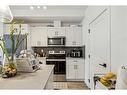 4111-200 Seton Circle Se, Calgary, AB  - Indoor Photo Showing Kitchen 