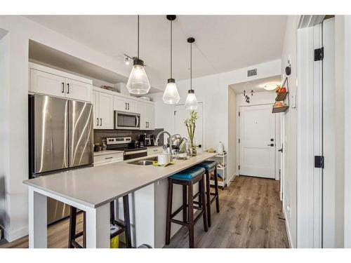 4111-200 Seton Circle Se, Calgary, AB - Indoor Photo Showing Kitchen With Stainless Steel Kitchen With Upgraded Kitchen