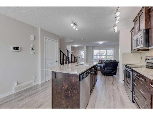 128 Copperpond Parade Se, Calgary, AB - Indoor Photo Showing Kitchen With Stainless Steel Kitchen With Upgraded Kitchen