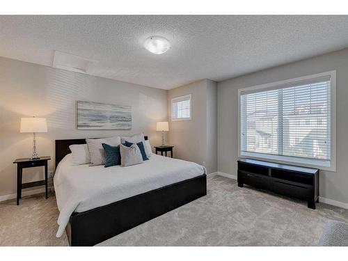 128 Copperpond Parade Se, Calgary, AB - Indoor Photo Showing Bedroom