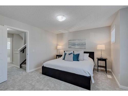 128 Copperpond Parade Se, Calgary, AB - Indoor Photo Showing Bedroom