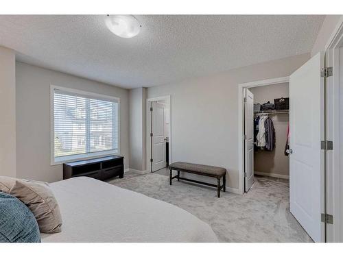 128 Copperpond Parade Se, Calgary, AB - Indoor Photo Showing Bedroom