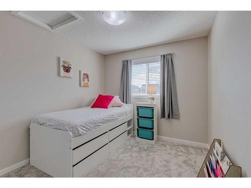 128 Copperpond Parade Se, Calgary, AB - Indoor Photo Showing Bedroom